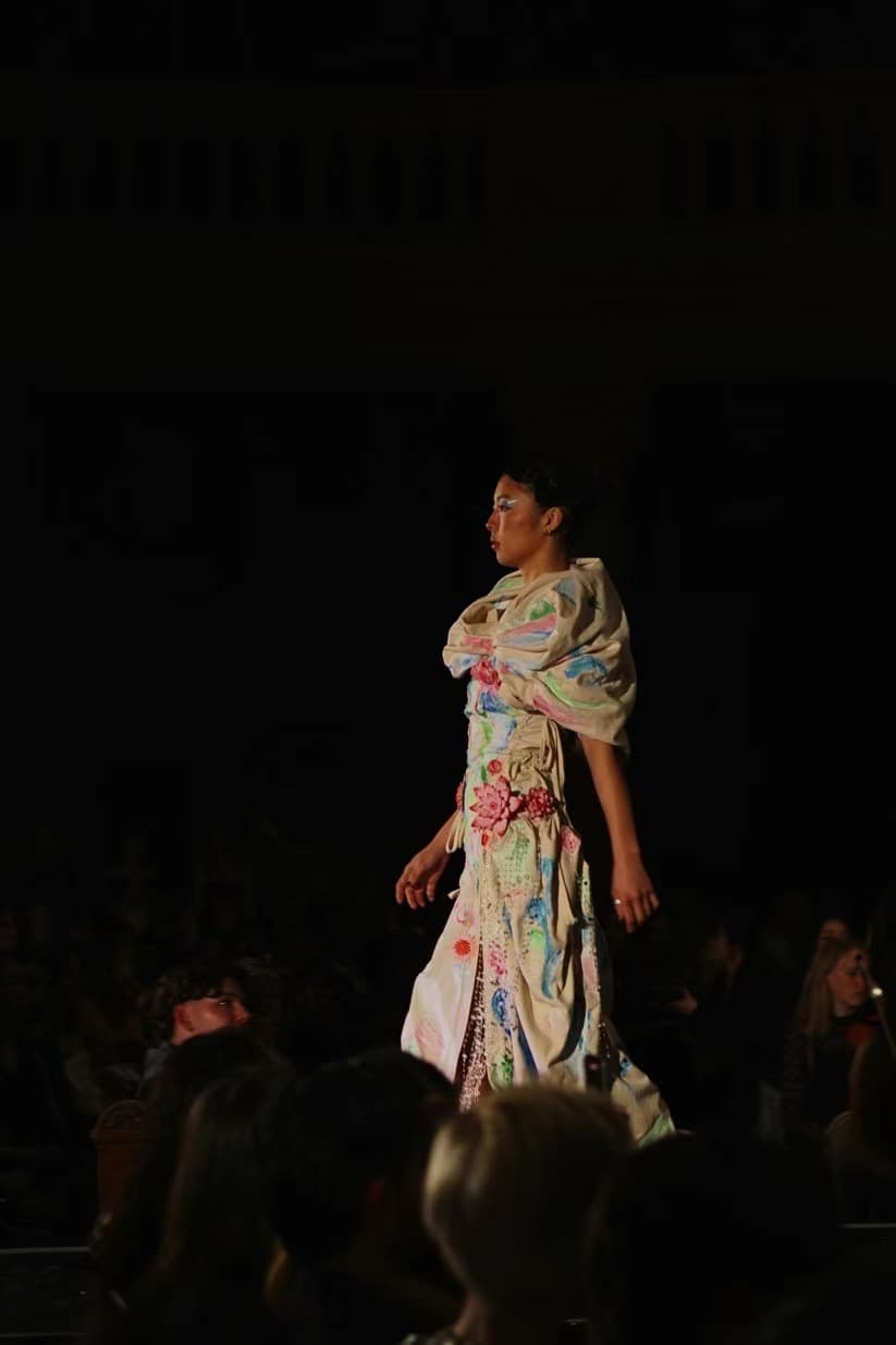 Model in embroidered sustainable gown