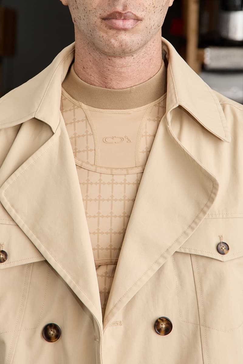 Detail of beige trench coat with bodysuit